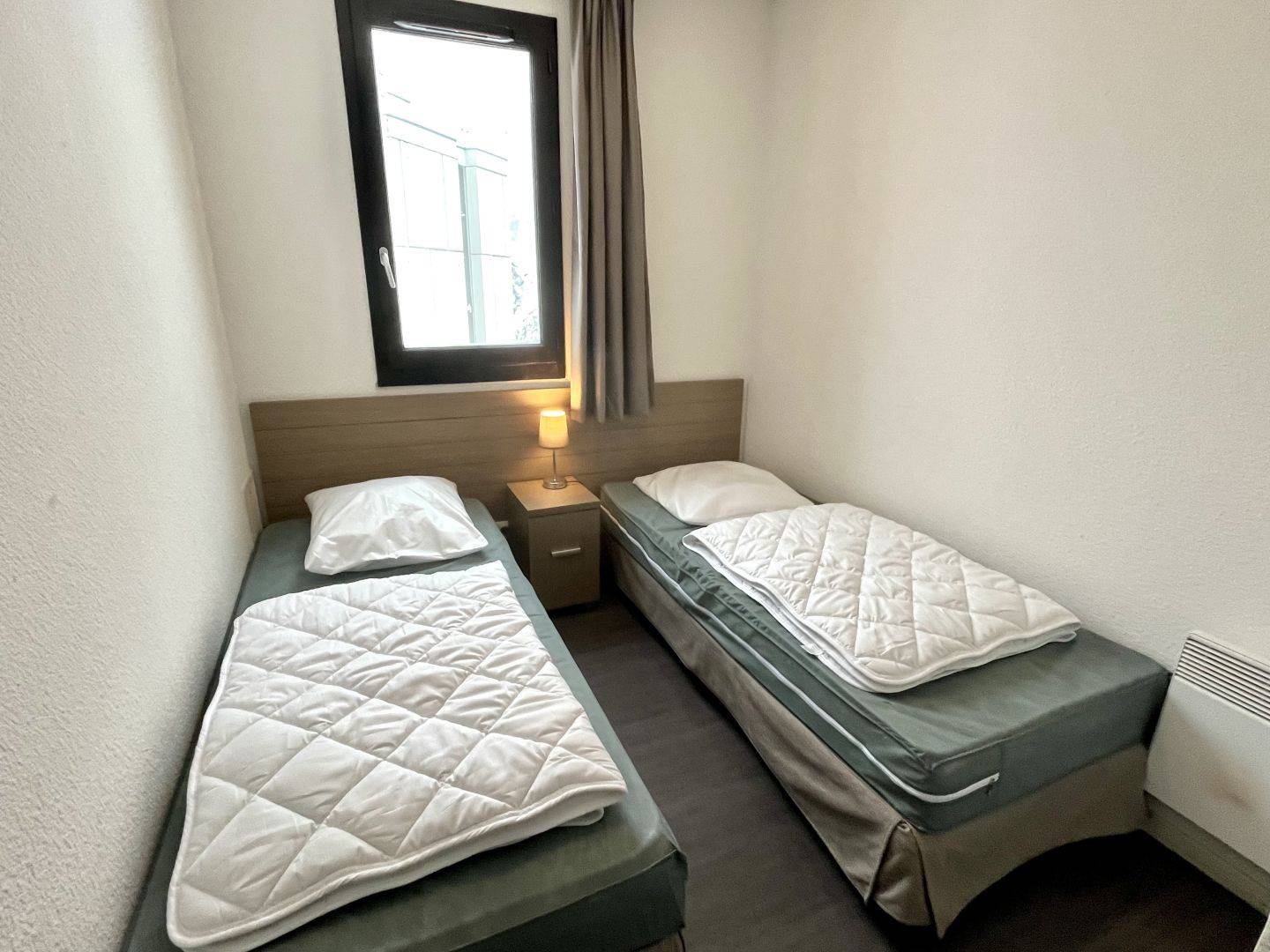 T4 avec CELLIER et STATIONNEMENT COUVERT - A COTE DES PISTES